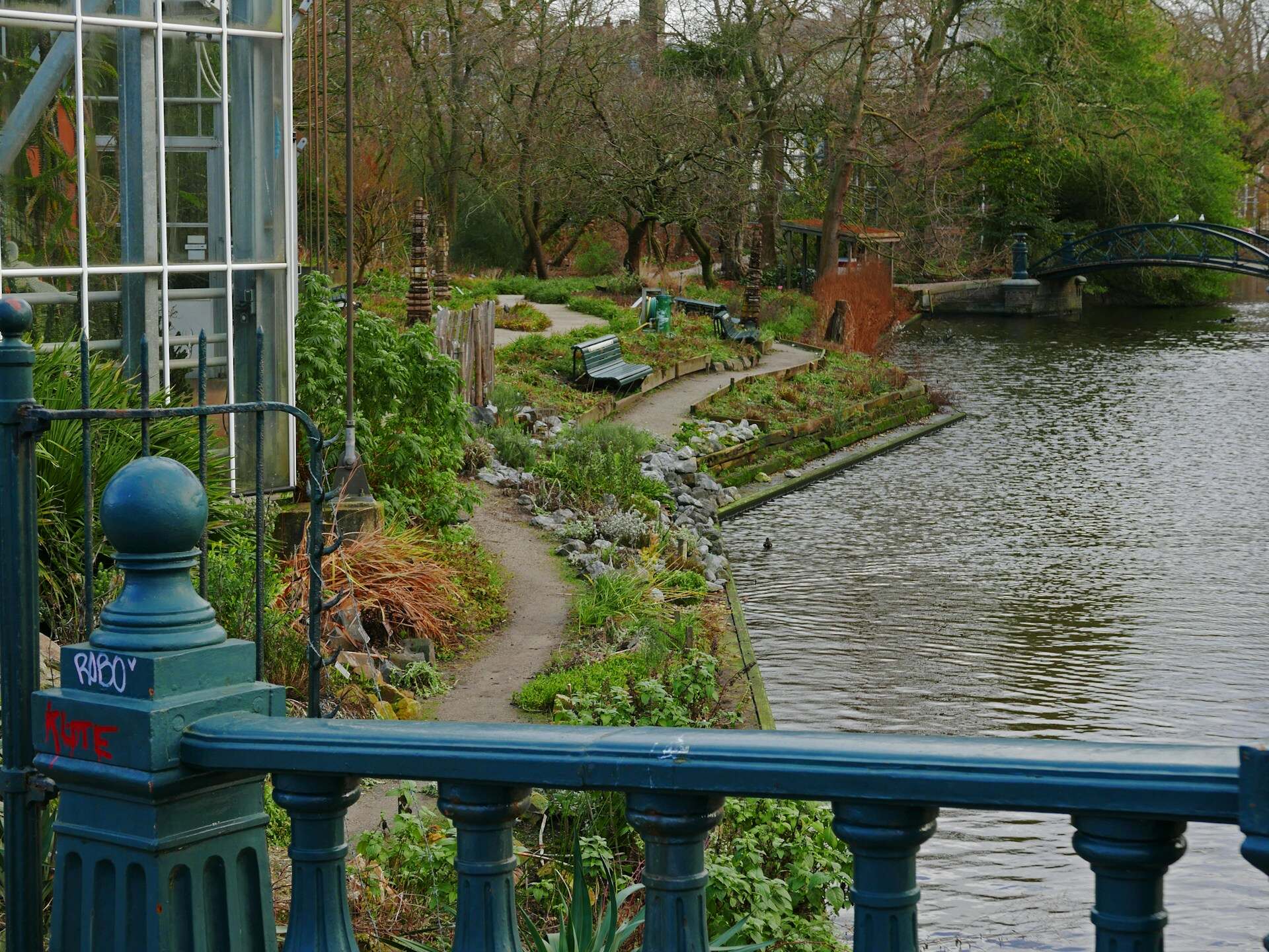 The lush and diverse Hortus Botanicus in Amsterdam, featuring the Palm House and vibrant plant collections.